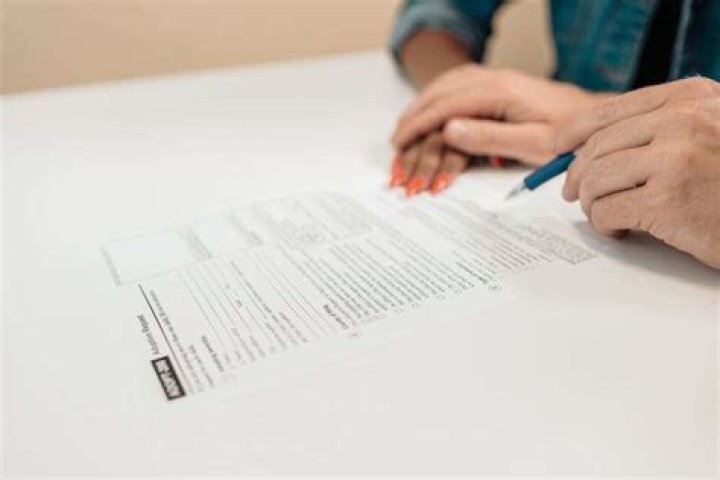 Does signing a birth certificate establish paternity?