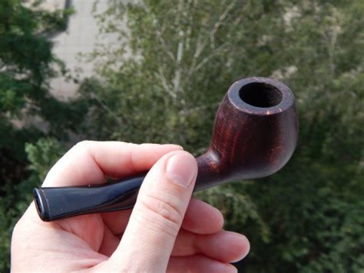 Why do pipe smokers not inhale?